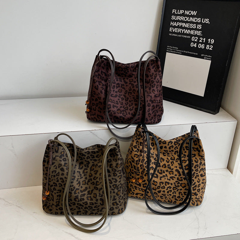 Suede-like Bead Pendant Bucket Bag